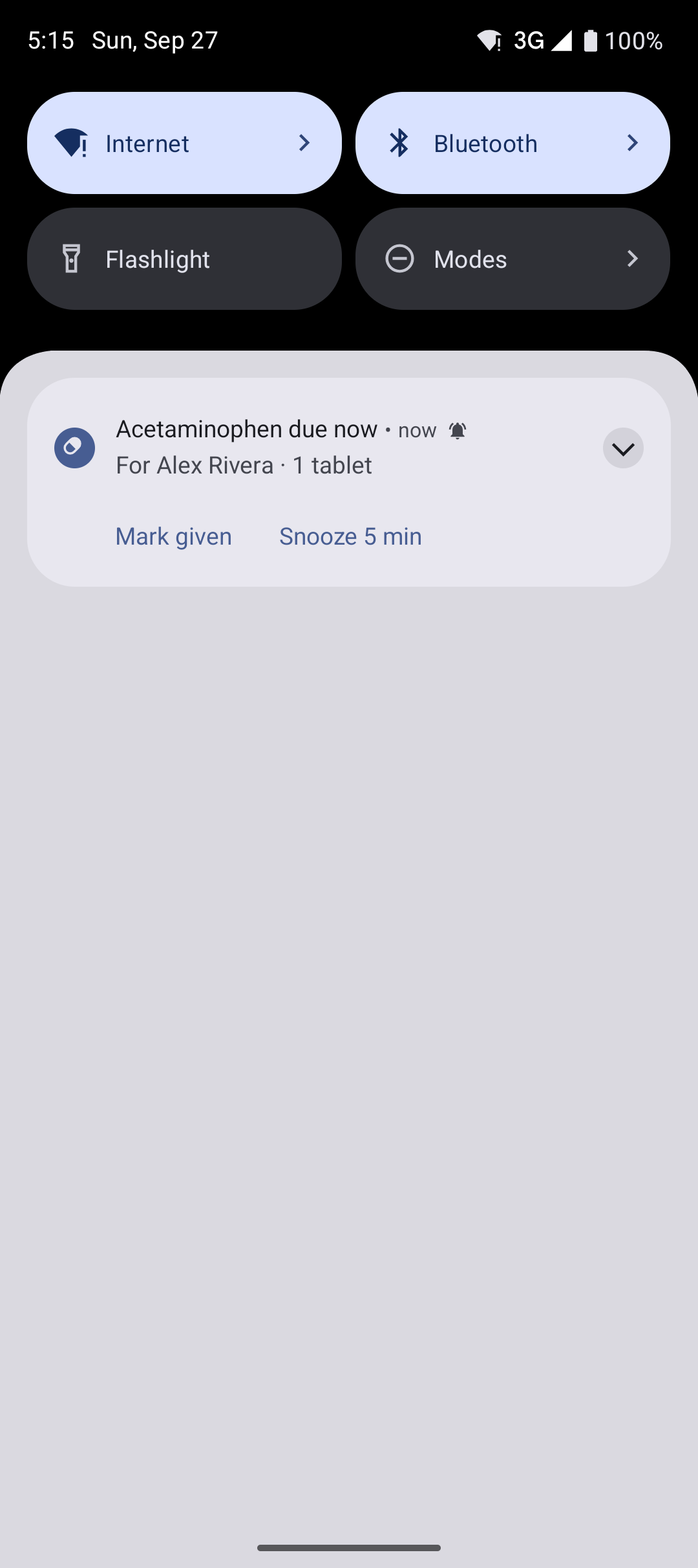 A reminder in the notification shade with Mark given and Snooze buttons